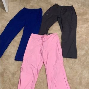 Three pairs of scrub pants